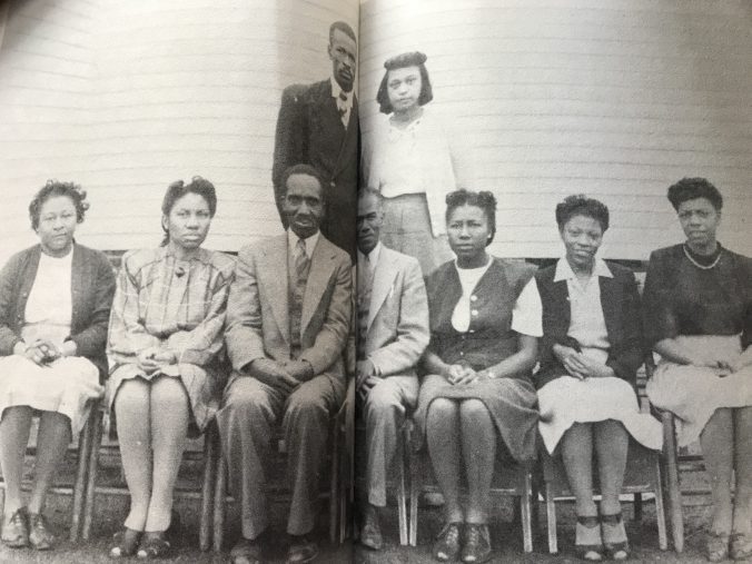 Hyde County Training School faculty, probably 1950s. Left to right, Senia Sheperd Johnson, Annie Bonner, John Raleigh Spencer, O. A. Peay, Rosa Mackey Bell, Beulah Kelsey McNair, Lucie B. Hargraves. Standing: Seward Selby, Rosaliner Hill. From Selby et.all, Hyde County History
