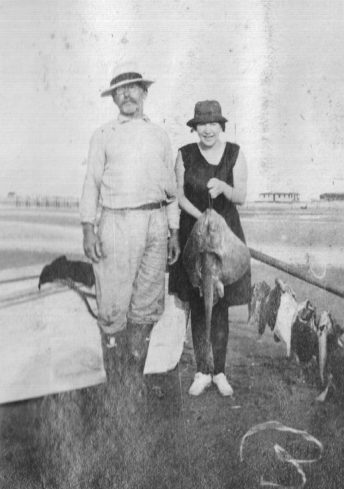 Capt. Charlie Willis and Coles' friend Theresa Ambler on a fishing trip at Cape Lookout, 1920. Courtesy, Walter Coles, Sr., Coles Hill, Va.