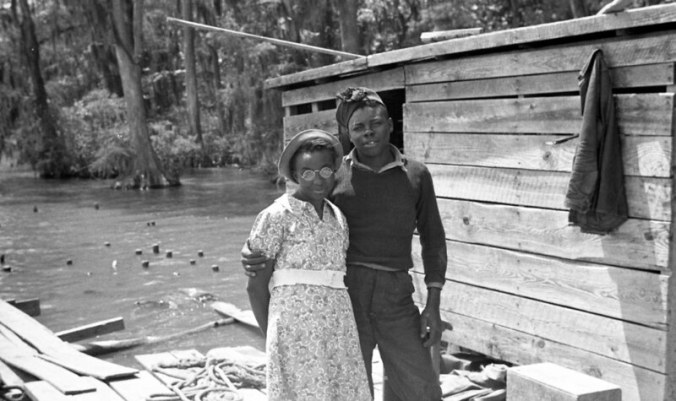 Young couple probably at the Terrapin Point fishery, located where in the Cashie River, the Roanoke & Albemarle Sound come together in Bertie County, N.C., ca. 1937-39. Photo by Charles A. Farrell. Courtesy, State Archives of North Carolina