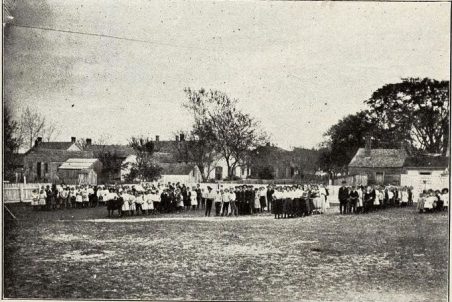The "Episcopal academy" was St. Paul's School, an Episcopalian school in Beaufort, N.C. (shown here ca. 1910 with students and faculty on the school grounds). Photo from Annual Catalog of St. Paul's School, 1909-1910. Special thanks to Mary Warshaw for posting the catalog on her wonderful blog on Beaufort's history.