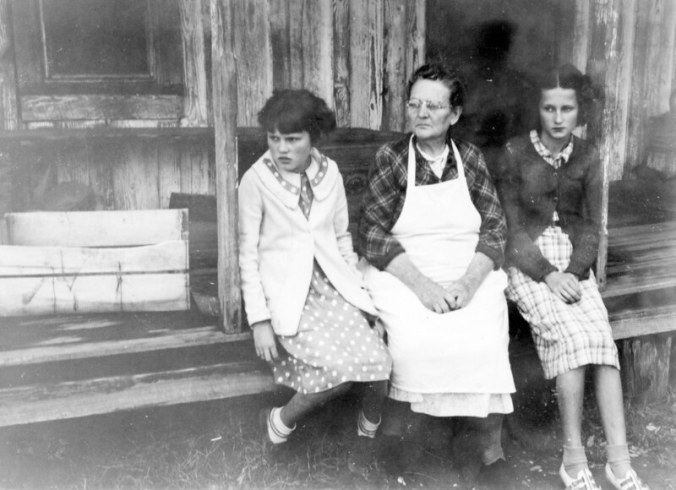 Sitting on a porch probably in Nags Head, on Bodie Island. Photo by Charles A. Farrell. Courtesy, State Archives of North Carolina